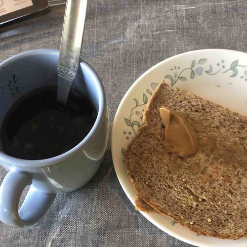 Snack Black coffee , Ezekeil bread & Almond butter