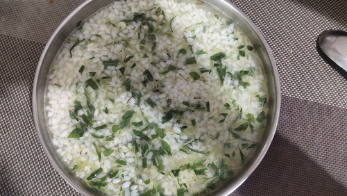 Tempered Rice porridge with microgreens