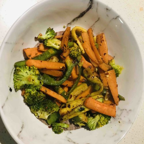 Stir fried veggies in a wok
