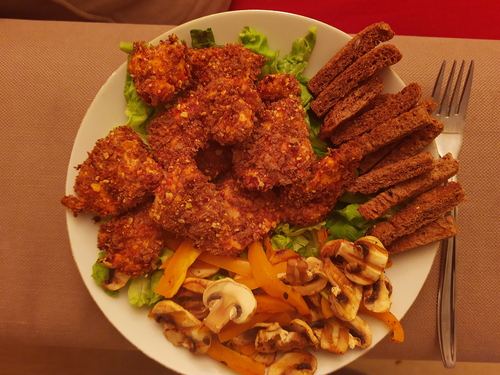 Chicken nuggets and grilled veggies salad