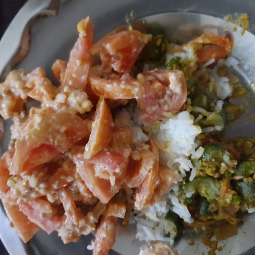 rice with tomato sald and sabji
