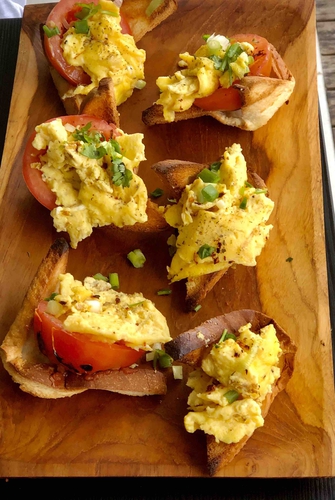 scrambled eggs in a basket