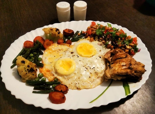 Sauteed veggies, chicken, chickpeas salad, eggs